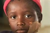 Joseph, 10-jährig: Mutter und Schwester verbrannten lebendigen Leibes. Er überlebte mit schweren Brand-, Schuss- und Schnittwunden. (csi)